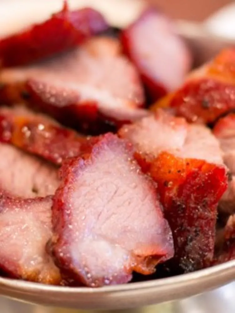 Sliced tender roasted char siu pork served in ceramic bowl at Golden Dragon Restaurant, a Chinese Restaurant in East Troy